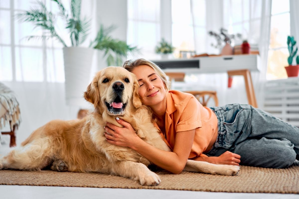 A pet owner enjoying a bond with her pet