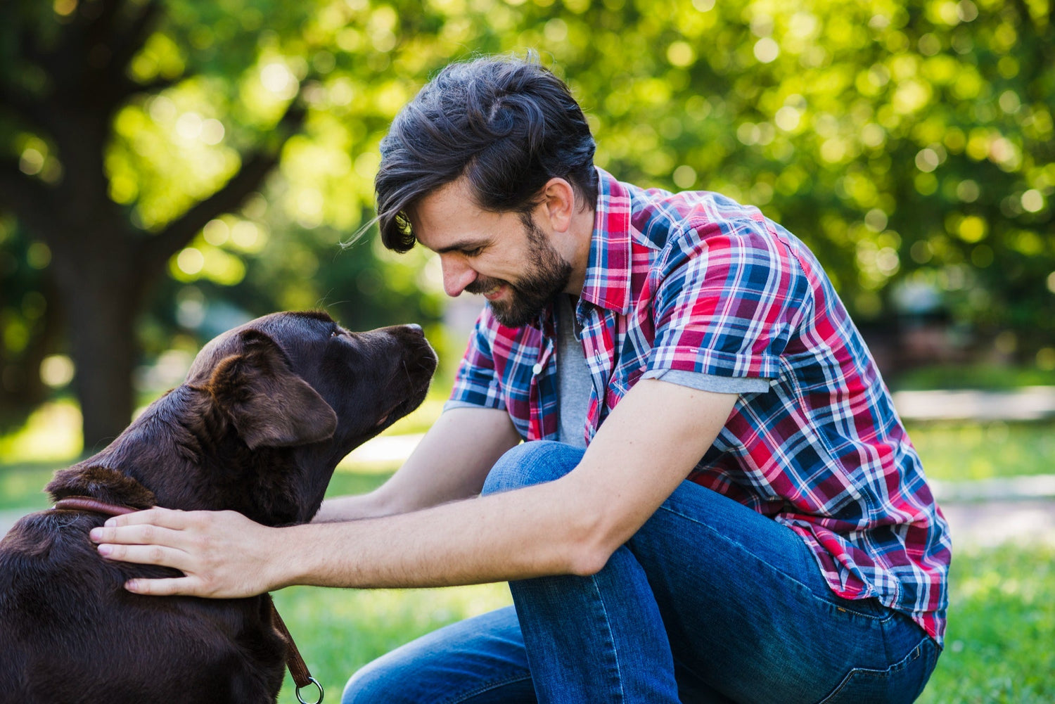 A joyful guy and his pet dog