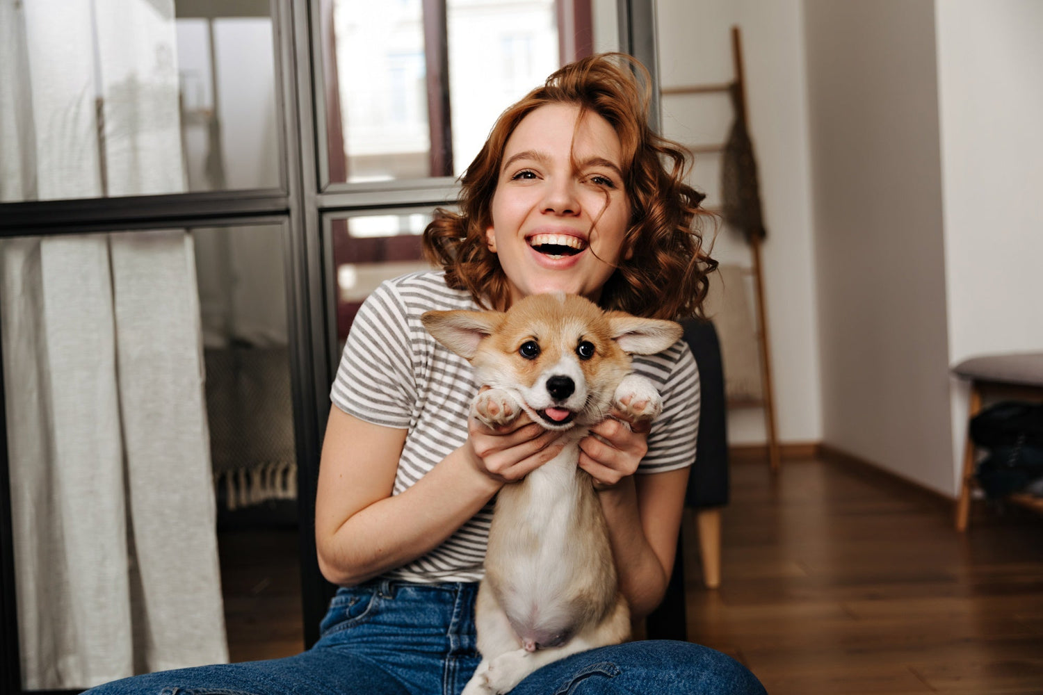 Woman plays with her beloved dog